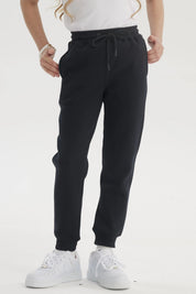 Pantalón jogger azul marino unisex con cintura elástica y cordón ajustable sin estampa visible liso y cómodo