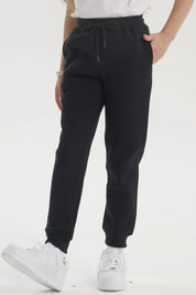 Pantalón jogger azul marino unisex con cintura elástica y cordón ajustable sin estampa visible liso y cómodo