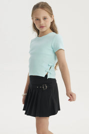 Polera calipso para niña con cinta decorativa en los costados lisa de manga corta ideal para días cálidos