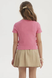 Polera niña fucsia con cintas laterales ajustables prenda lisa ideal para un look fresco y divertido