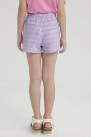 Short morado para niña con textura de ondas horizontales sin estampa visible