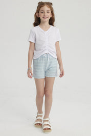 Short celeste para niña con textura ondulada sin estampa ajustable con lazo blanco ideal para el verano