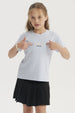 Polera celeste para niña con diseño de margaritas y texto Keep Smile en el pecho estilo casual y alegre