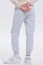 Pantalón Buzo niña Bipack Rosado liso con bolsillos