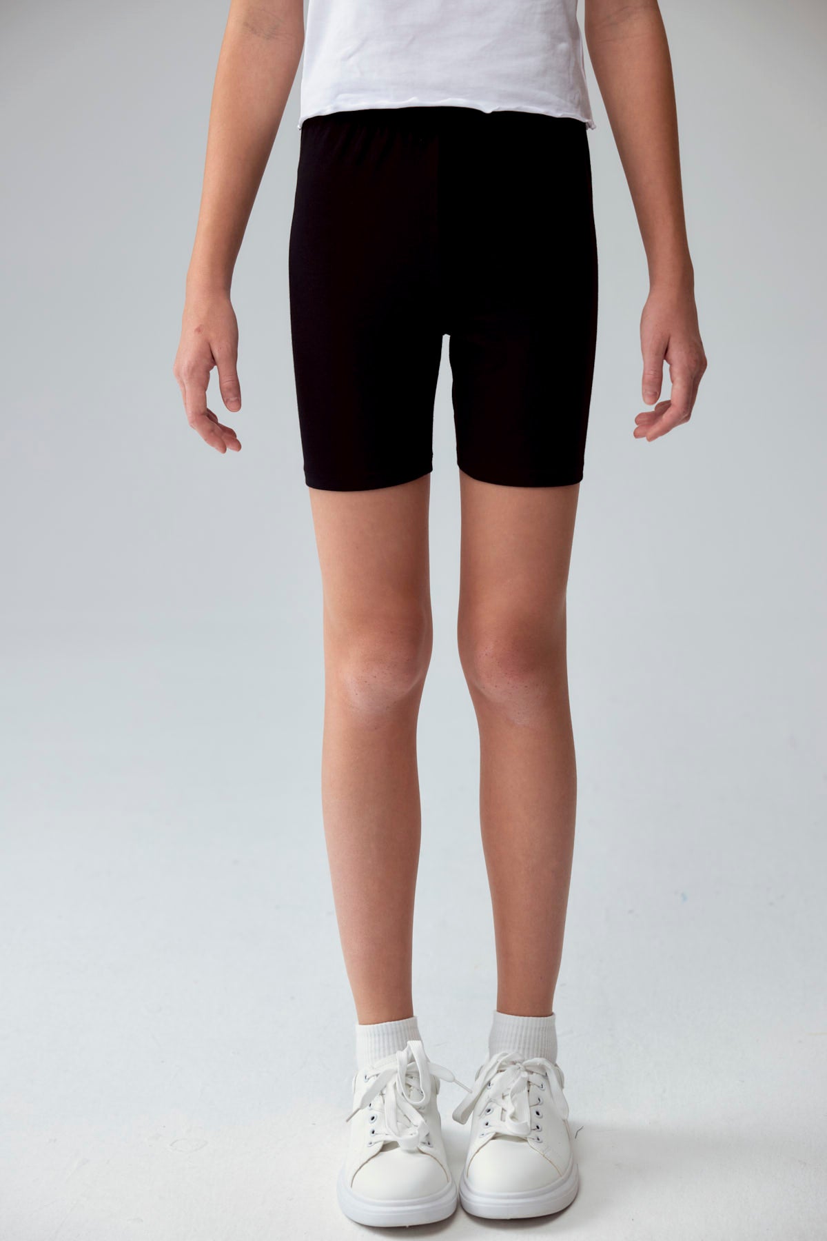 Calza niña biker café con estampado de leopardo y cintura elástica