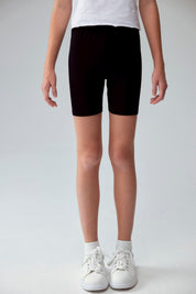 Calza niña biker café con estampado de leopardo y cintura elástica