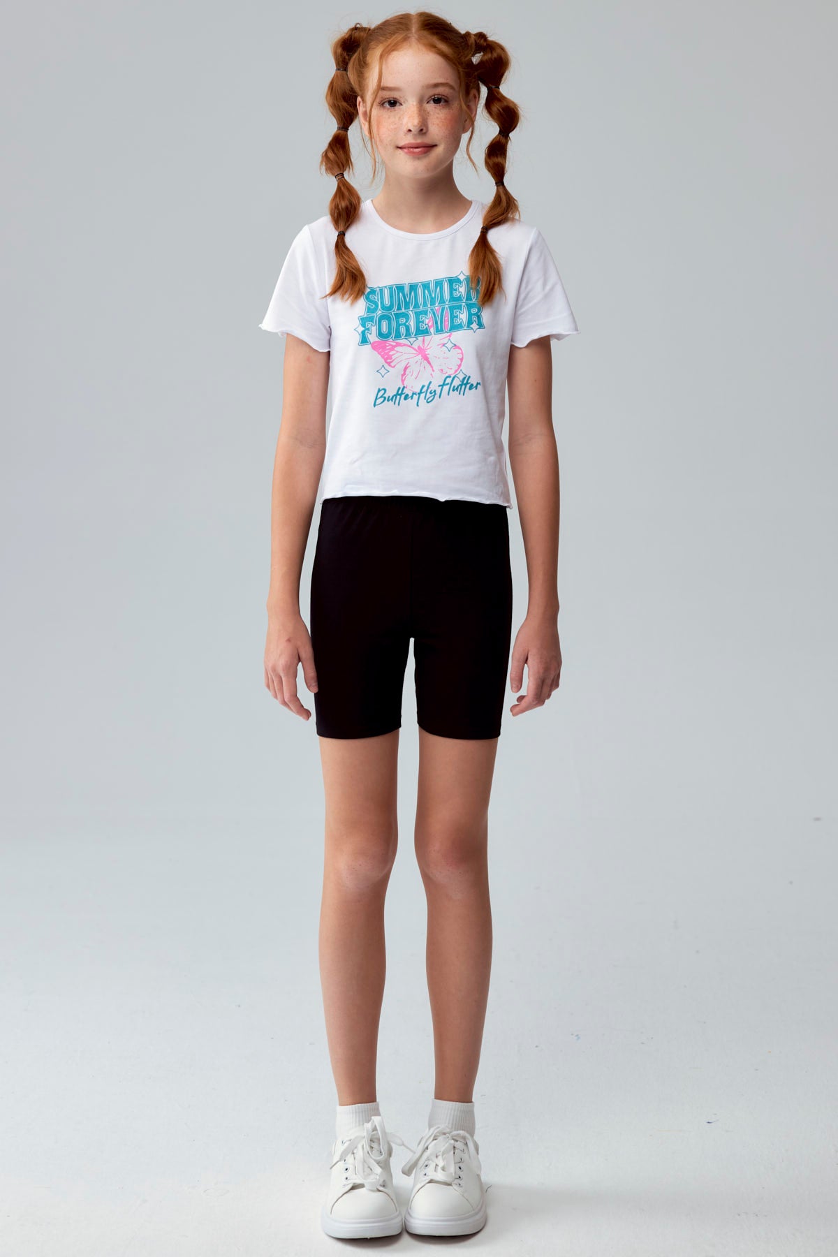 Calza niña biker café con estampado de leopardo y cintura elástica