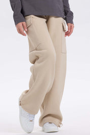 Pantalón buzo niña cargo beige con bolsillos grandes