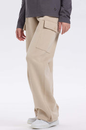 Pantalón buzo niña cargo beige con bolsillos grandes