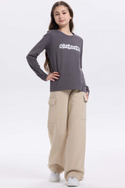 Pantalón buzo niña cargo beige con bolsillos grandes
