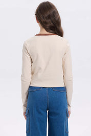 Polera beige niña con Aplicación Believe in Yourself