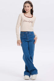 Polera beige niña con Aplicación Believe in Yourself