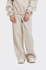 Pantalón buzo niña wide leg brillo beige