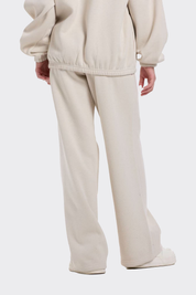 Pantalón buzo niña wide leg brillo beige