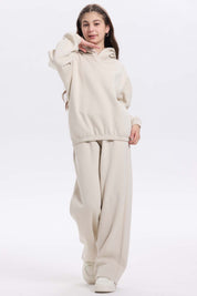 Pantalón buzo niña wide leg brillo beige