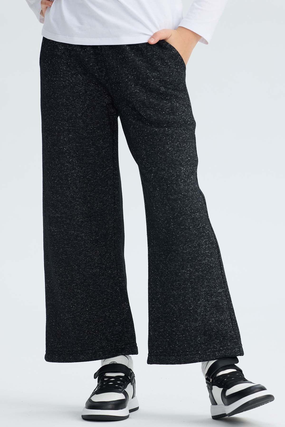 Pantalón Buzo niña Wide Leg Brillo Negro