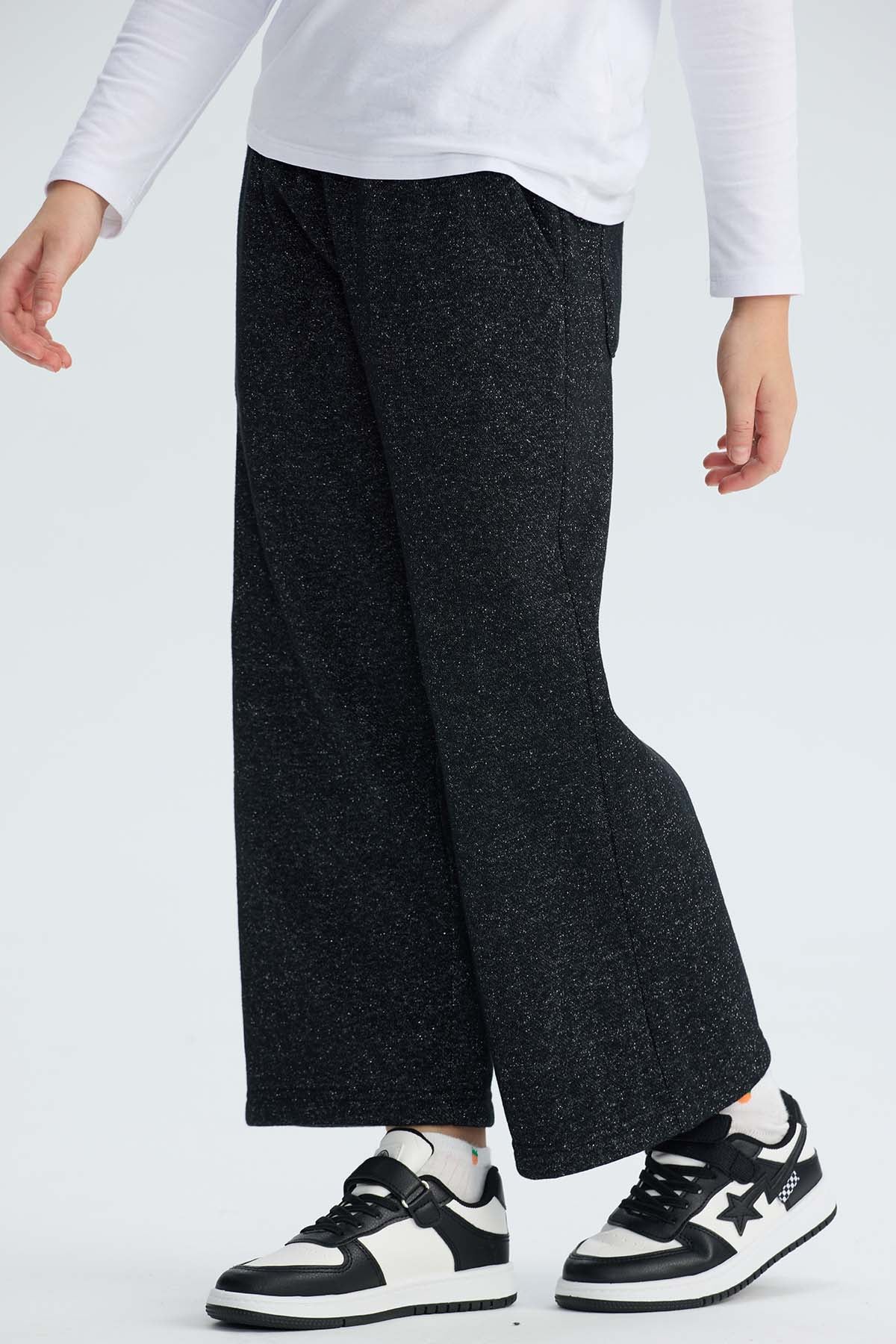 Pantalón Buzo niña Wide Leg Brillo Negro