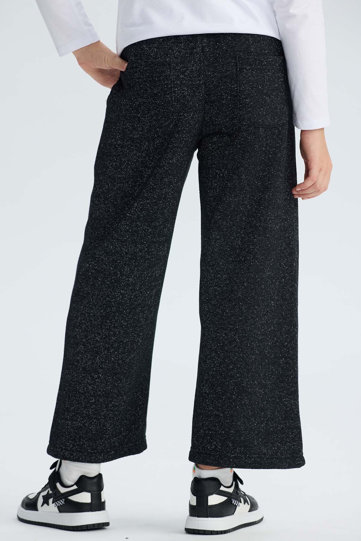 Pantalón Buzo niña Wide Leg Brillo Negro