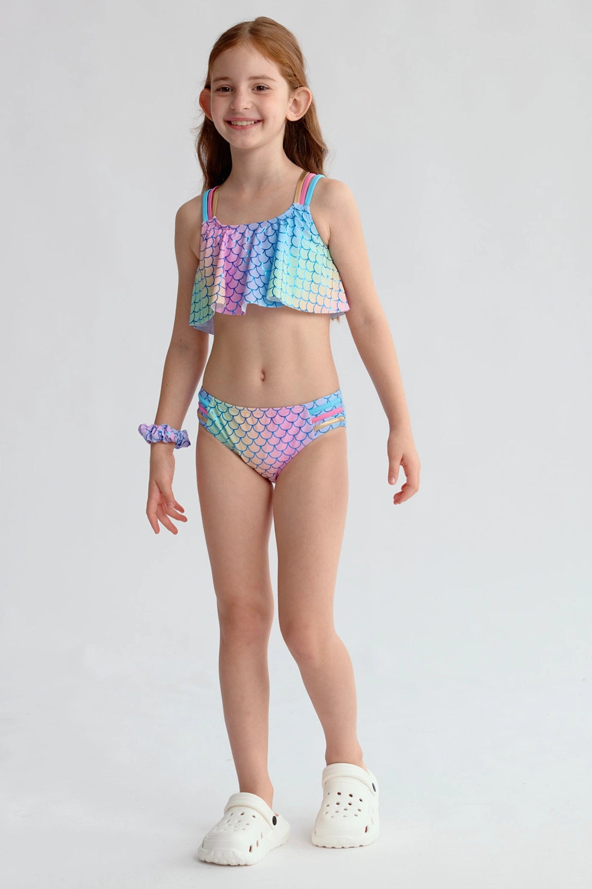 Traje de baño niña full print azul con estampado de escamas de sirena multicolor