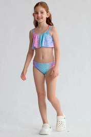 Traje de baño niña azul con estampado de escamas y detalles en rosa y morado