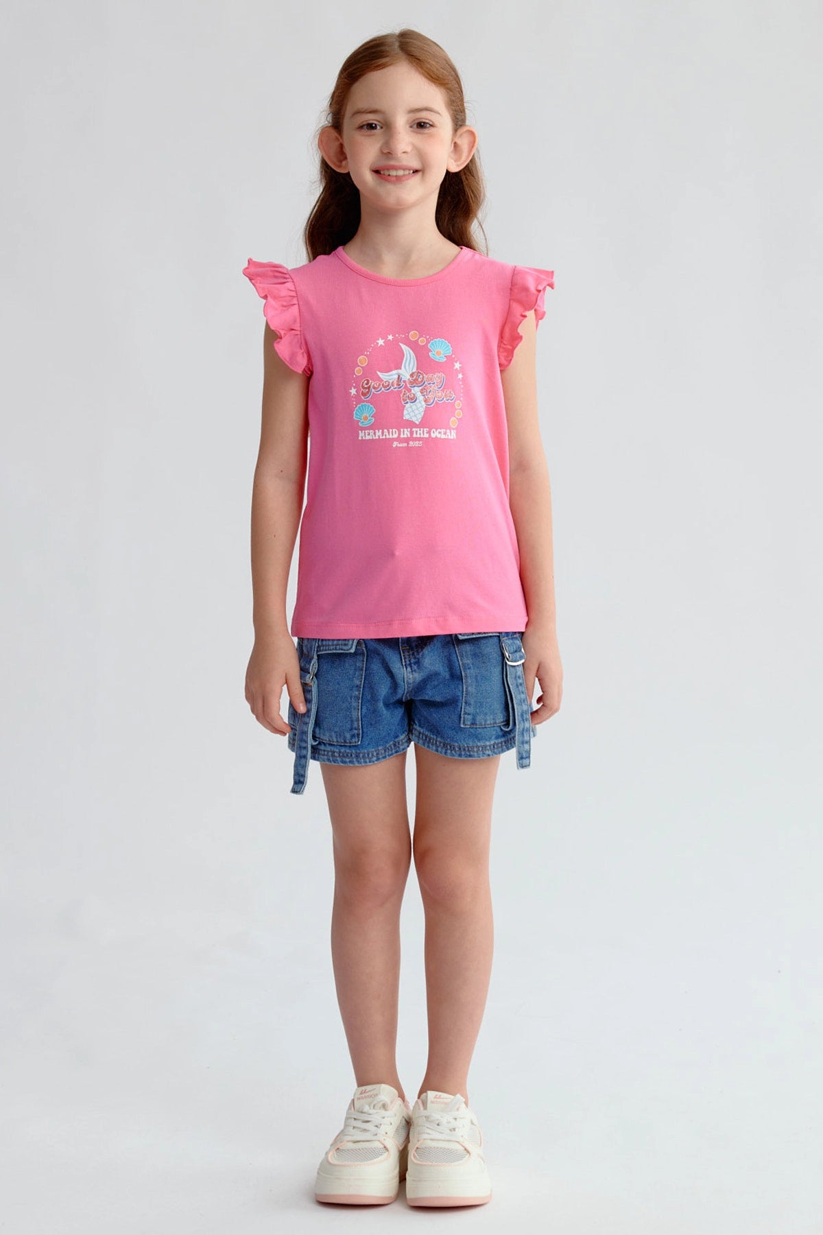 Polera Niña Con Vuelos Fucsia