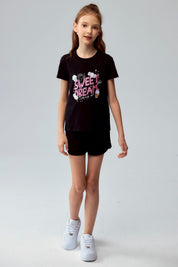 Short negro para niña con diseño liso y cordón ajustable visible