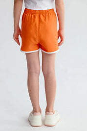 Short de baño liso naranjo con ribete blanco y cordón ajustable