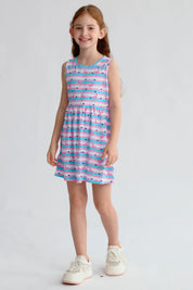 Vestido niña blanco con estampado de flamencos rosas y rayas azules y blancas