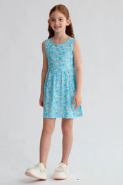 Vestido niña celeste con estampado de arcoíris y flores sin mangas