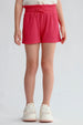 Short niña color fucsia con cintura elasticada y textura visible