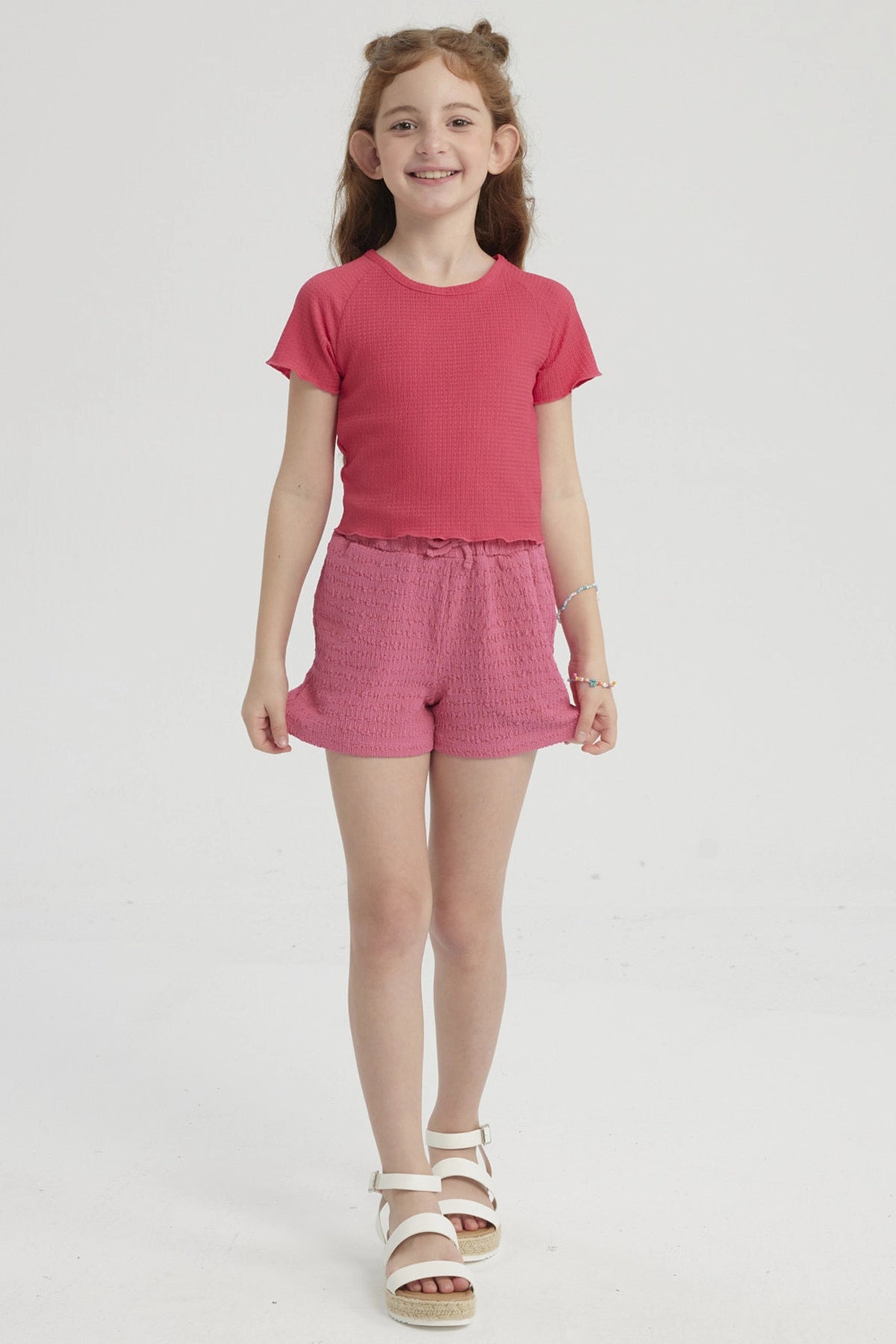 Polera Niña Lisa Textura Fucsia