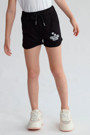 Short niña mini print negro con estampado Summer Vibes y cordón ajustable.