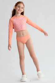 Traje de baño coral con polera de manga larga y diseño floral