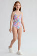Traje de baño rosado para niña con estampado de hojas coloridas y espalda cruzada