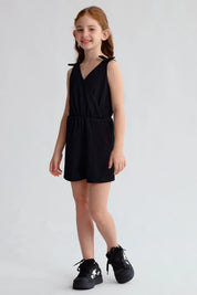 Enterito negro niña con nudos en los hombros y diseño sin mangas