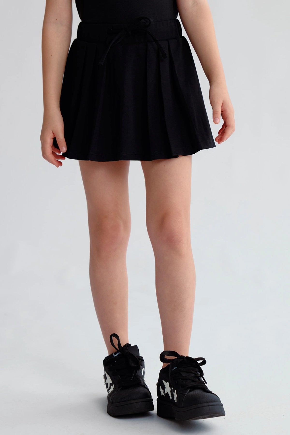 Falda Niña Tableada Con Lazo Negro