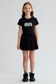 Falda Niña Tableada Con Lazo Negro