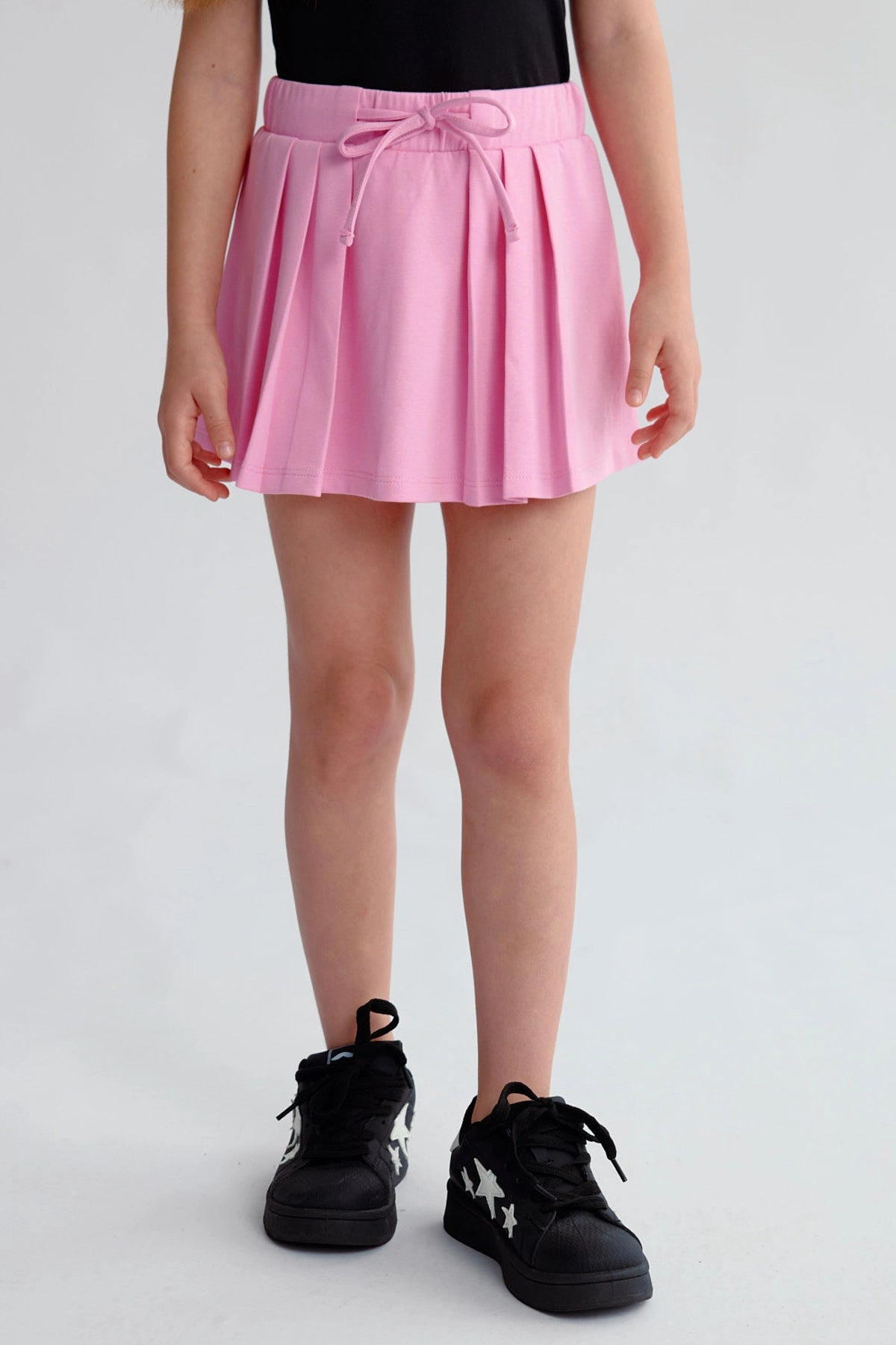 Falda Niña Tableada Con Lazo Rosado