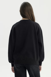 Polerón negro para niña con estampado blanco 89 LONDON en el frente estilo casual y relajado sin capucha