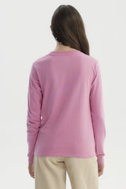 Polera rosada de manga larga con texto Happy Forever en el pecho estilo casual y juvenil