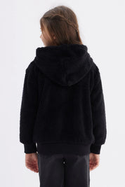 Polar niña negro peludo con capucha y bolsillos delanteros lisa ideal para días fríos y acogedores