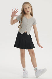 Polera niña gris melange con botones decorativos al frente diseño de lazo lisa