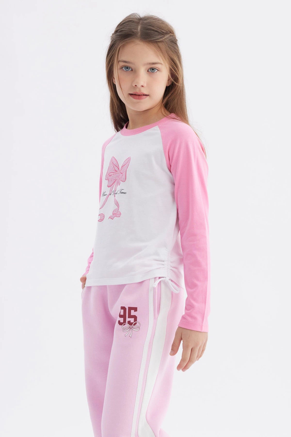 Polera Niña Recogido Costado Rosado