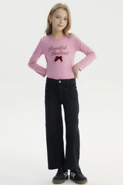 Jeans negros wide leg para niña con bolsillos grandes al frente diseño liso cómodo y moderno ideal para cualquier ocasión