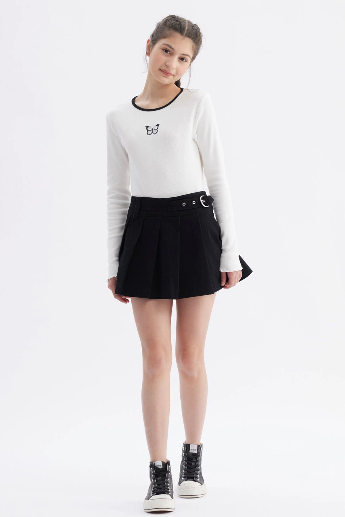 Falda negra para niña con slip integrado diseño plisado cinturilla ajustable sin estampa lisa ideal para el día a día