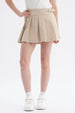 Falda beige para niña con slip integrado diseño plisado cinturón ajustable detalle en el lado sin estampa lisa