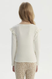 Polera crudo niña de manga larga con tejido acanalado lisa y ajuste slim perfecta para un look casual y cómodo