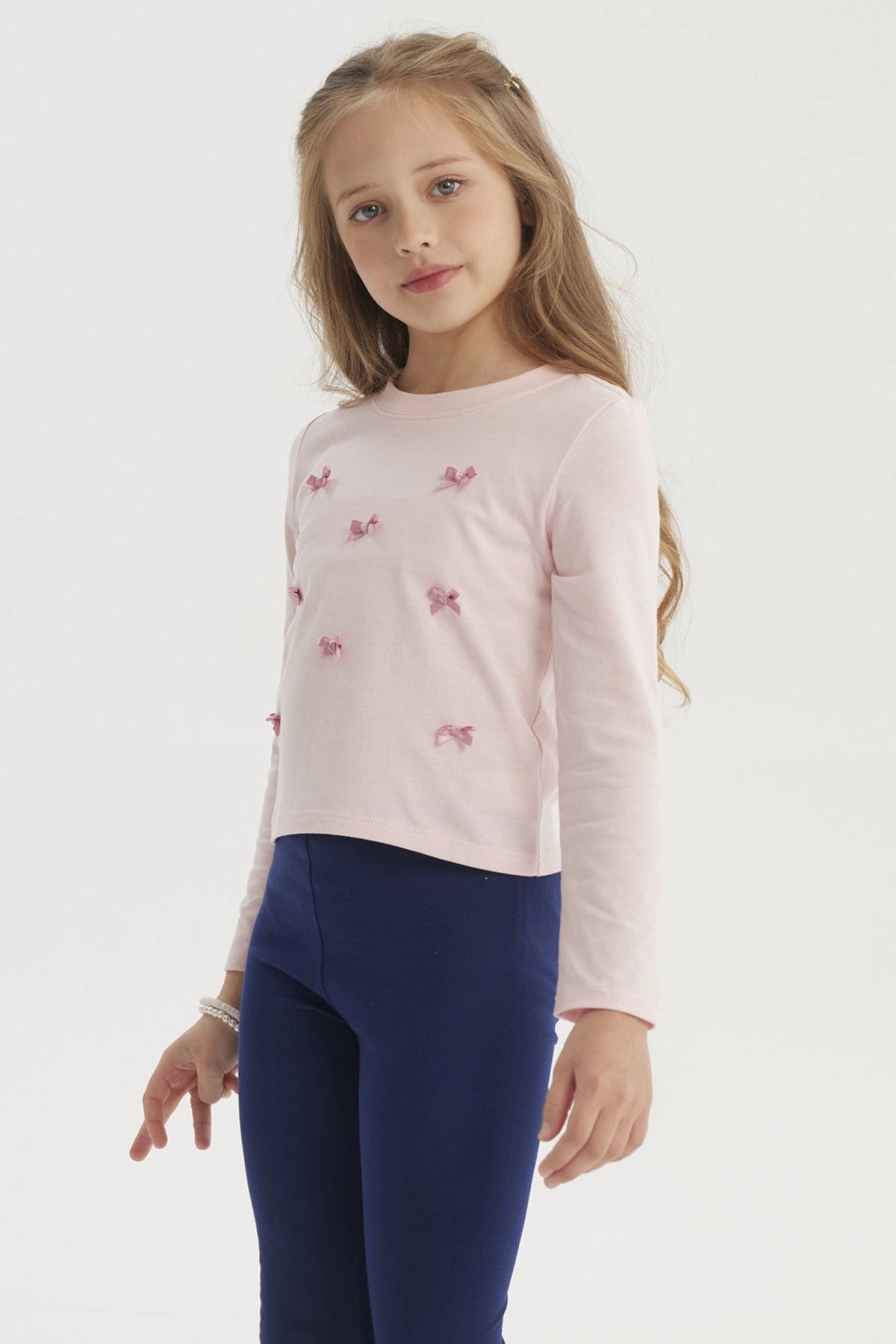 Polera Niña Aplicación Lazos Rosado