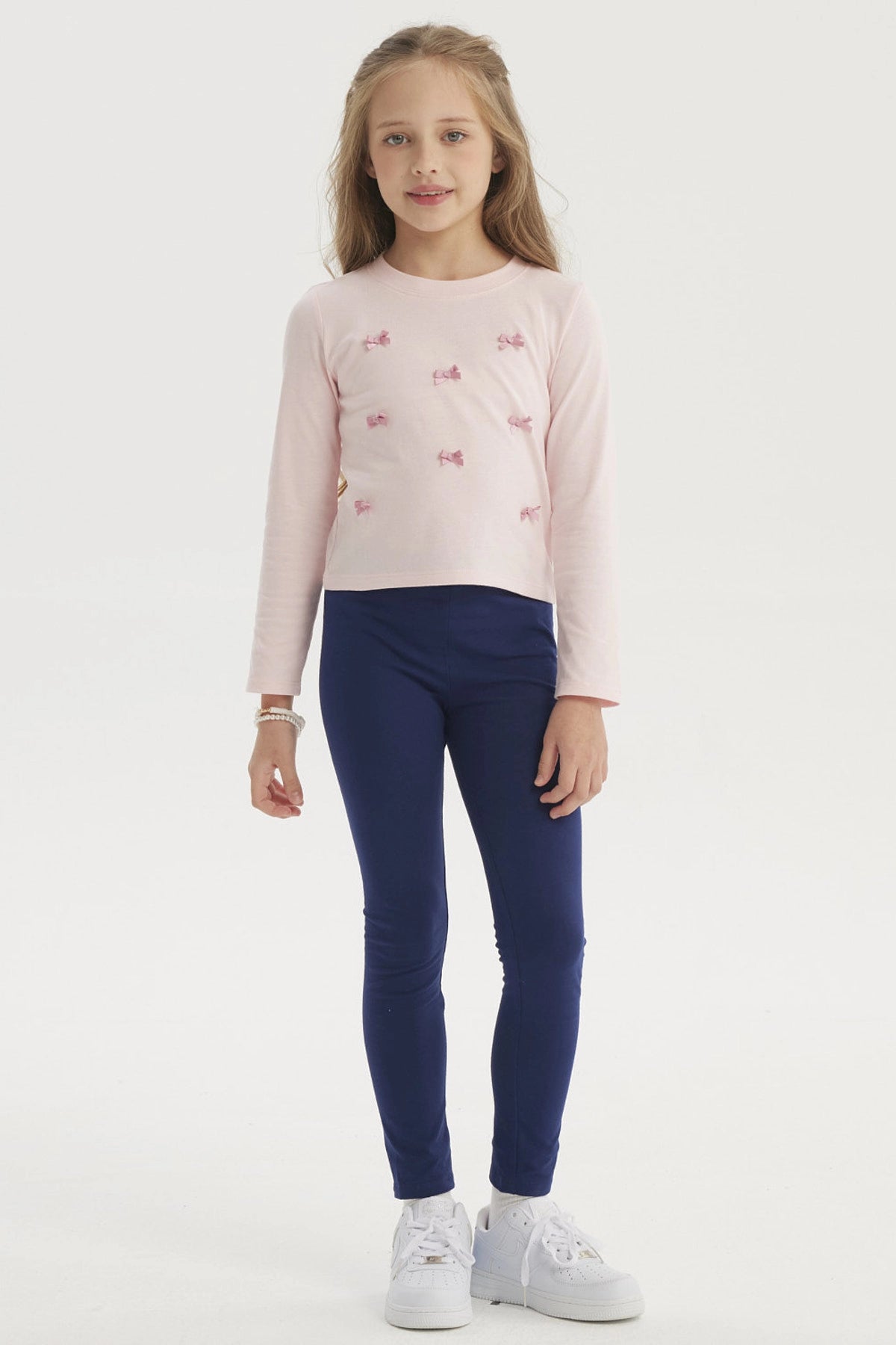 Polera Niña Aplicación Lazos Rosado