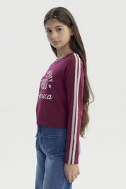 Polera niña slim roja con texto blanco New York City 1987 America al frente diseño casual y juvenil
